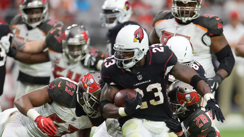 Adrian Peterson uniká obraně Tampy