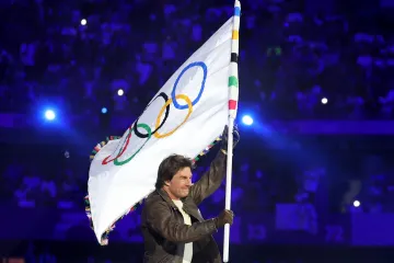 Tom Cruise s olympijskou vlajkou