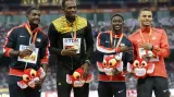 Medailisté stovky. Uprostřed zlatý Usain Bolt, vlevo stříbrný Justin Gatlin a bronzoví Trayvon Bromell a Andre De Grasse
