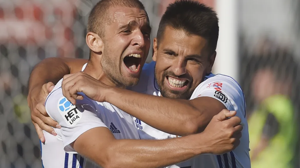 Marek Hlinka a Milan Baroš se radují po gólu Baníku