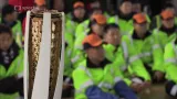 Olympijská pochodeň se dostala i k jihokorejským dělníkům