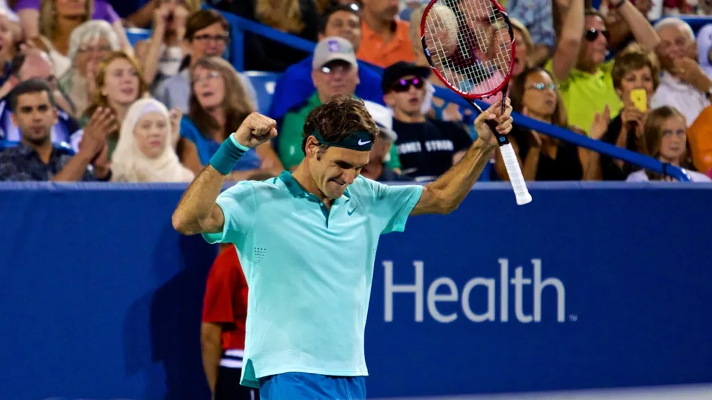 Slavící Roger Federer