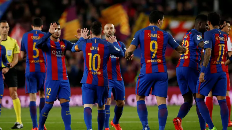 Slavící fotbalisté Barcelony