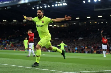 Luis Suárez se raduje z gólu na stadionu Manchesteru United v Lize mistrů
