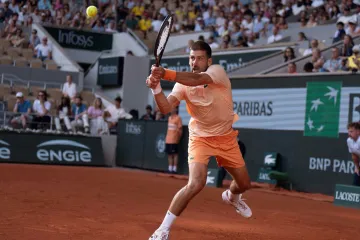 Novak Djokovič v zápase s Joaem Fonsecou