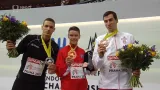 Medailový ceremoniál po zlatém závodu Pavla Masláka