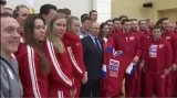 Putin se rozloučil s ruskými sportovci, hokejisti mu darovali dres