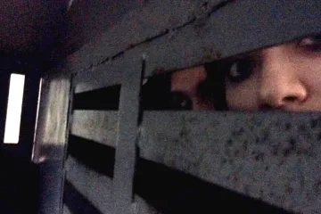 Fotografie Aljochinové z policejního vozu