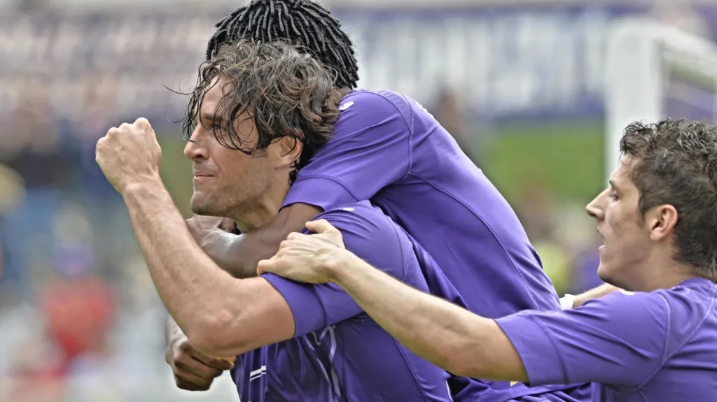 Slavící Luca Toni