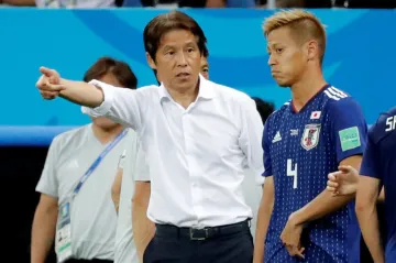 Trenér Akira Nišino