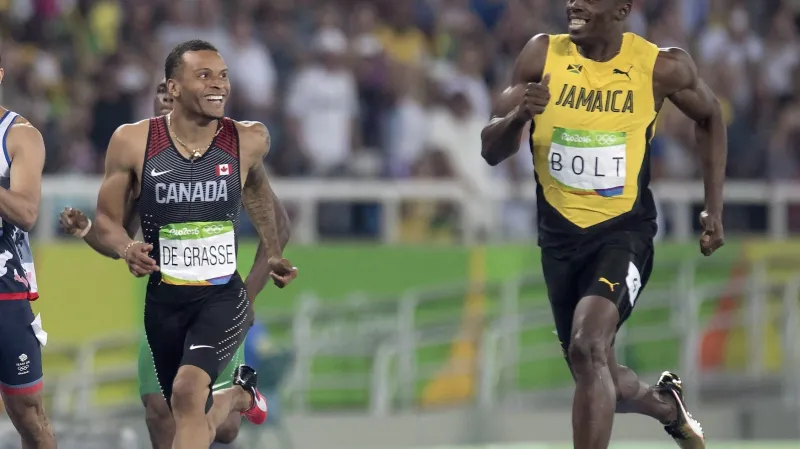 Kanaďan Andre de Grasse a Jamajčan Usain Bolt