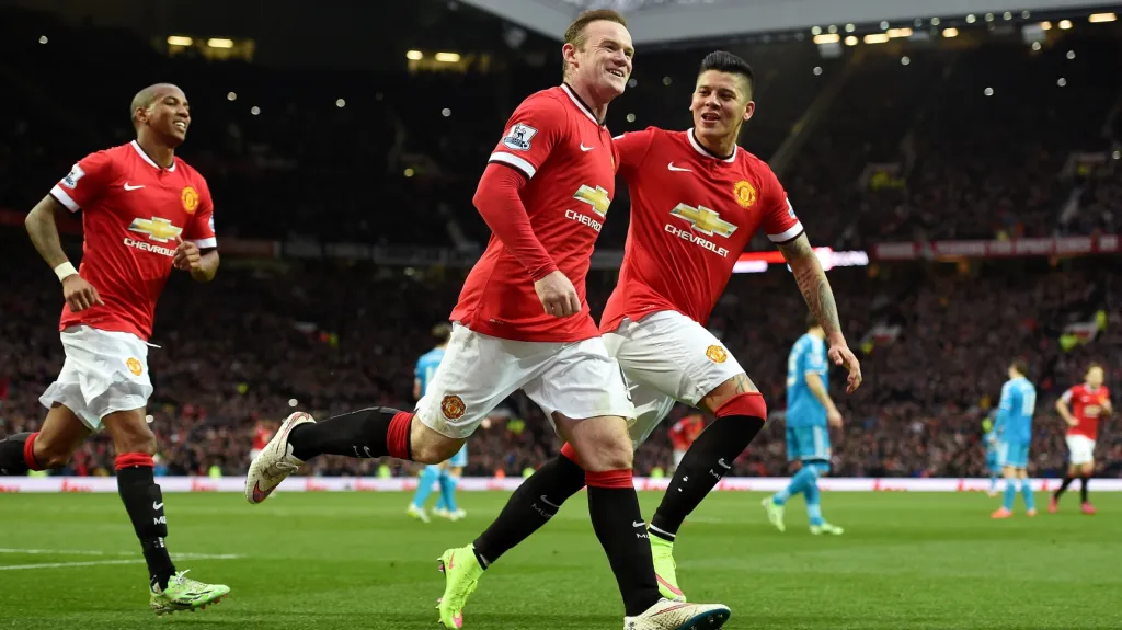 Slavící Wayne Rooney (uprostřed) se spoluhráči