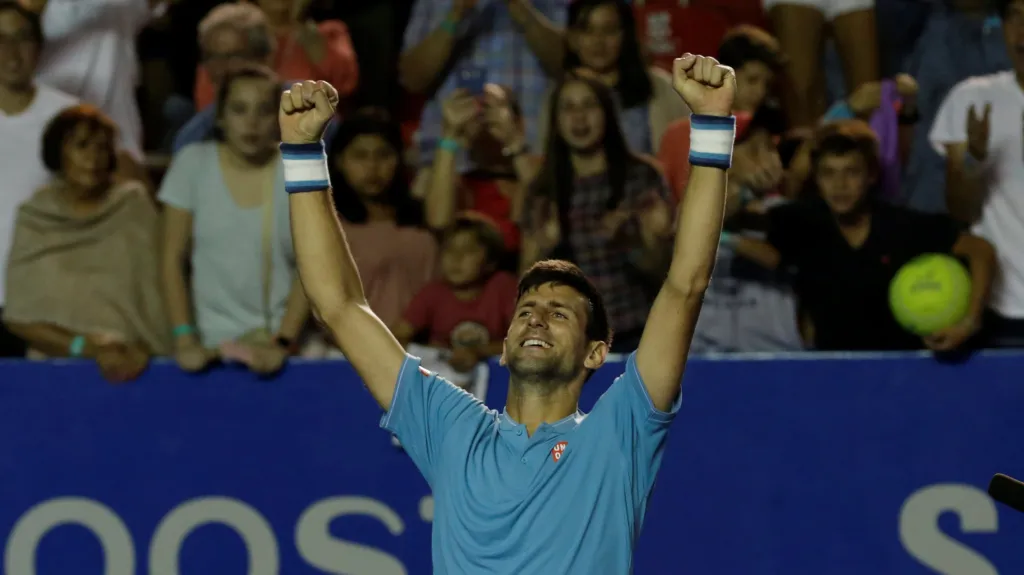 Slavící Novak Djokovič