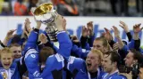 Hráči Finska se radují s trofejí pro mistry světa