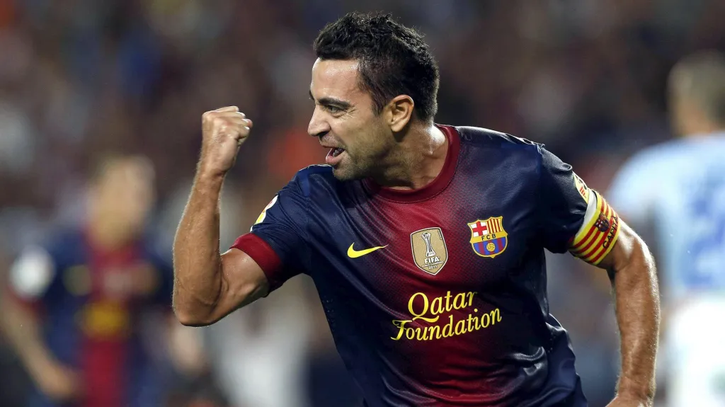 Xavi slaví vítězný gól utkání s Granadou