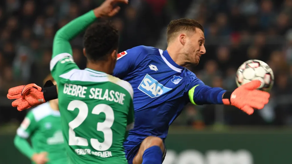 Theodor Gebre Selassie a Oliver Baumann