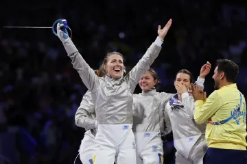 Olga Charlanová a ukrajinský tým