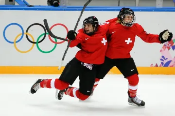 Radující se hokejistky Švýcarska