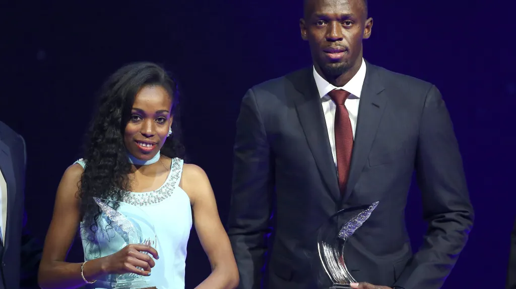Almaz Ayanaová a Usain Bolt s trofejemi