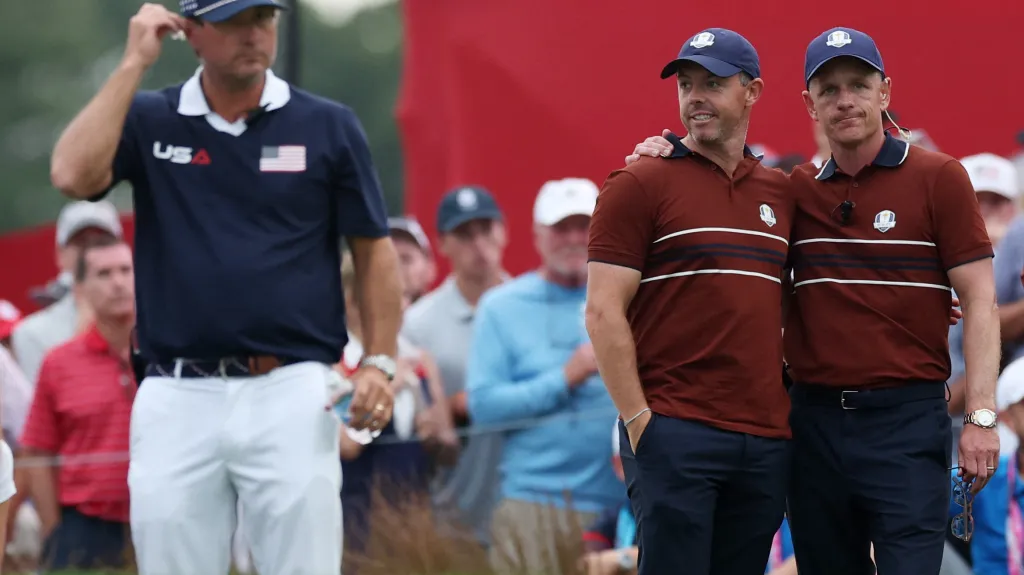 Rory McIlroy a kapitán golfistů Evropy Luke Donald