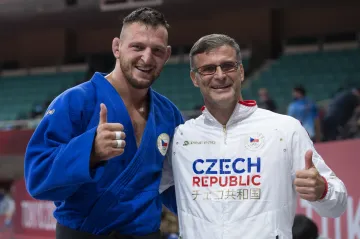 Lukáš Krpálek s trenérem Petrem Lacinou