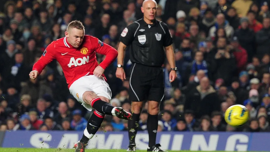 Wayne Rooney se sudím Webbem