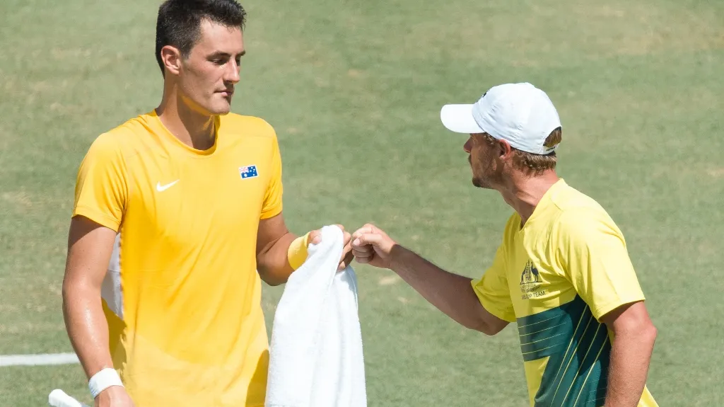 Bernard Tomic a Lleyton Hewitt