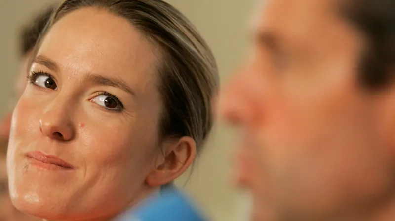 Justine Heninová s trenérem Carlosem Rodríguezem