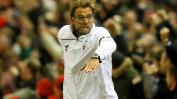 Slavící manažer Liverpoolu Jürgen Klopp