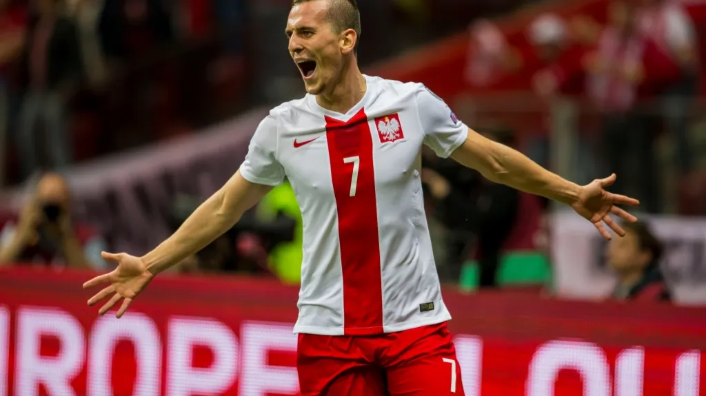 Milik slaví gól do sítě Německa