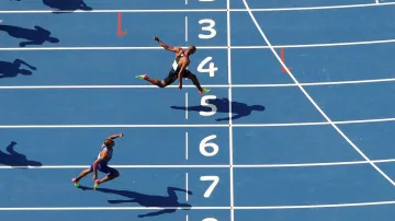 Damian Warner překonává olympijský rekord