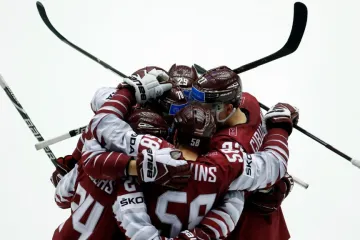 Radující se hokejisté Lotyšska