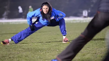 Šárka Kašpárková pomáhala závodníkům s rozcvičením