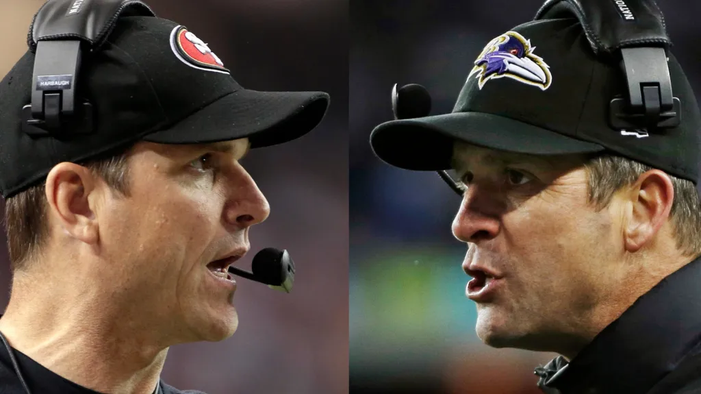 Jim (vlevo) a John Harbaughovi