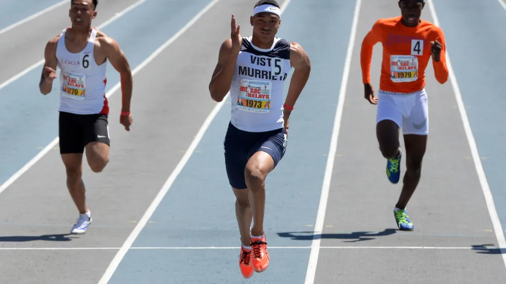 Michael Norman (uprostřed)