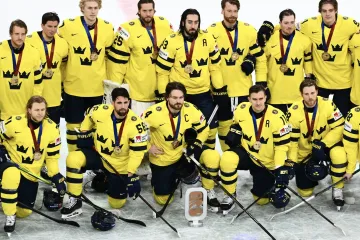 Švédští hokejisté s bronzovými medailemi