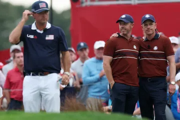 Rory McIlroy a kapitán golfistů Evropy Luke Donald