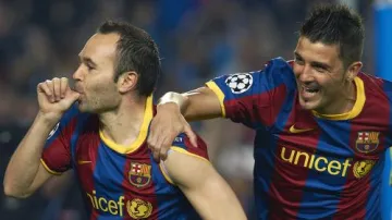 Andres Iniesta a David Villa