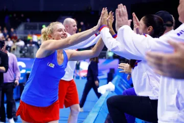 Kateřina Siniaková slaví s týmem