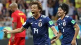 Japonec Takaši Inui se raduje z gólu v síti Belgie