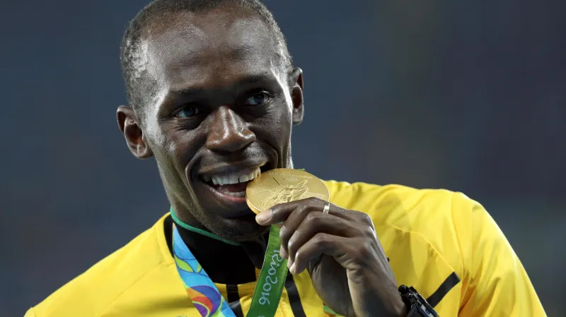 Usain Bolt se zlatou medailí z OH