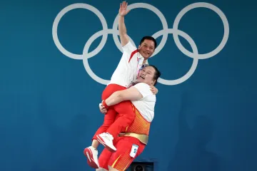 Číňanka Li Wen-wen s trenérem