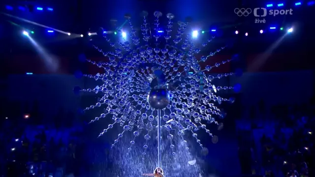 Olympijský oheň uhasil tropický lijavec